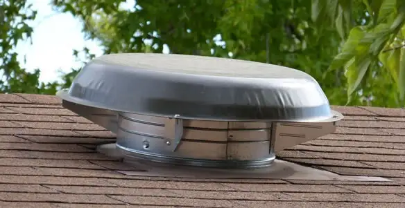 attic fan installation services with low-profile roof ventilation unit in New Orleans, LA