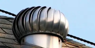 attic fan installation services with professionally installed roof ventilation unit in New Orleans, LA