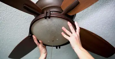 Ceiling fan repair and reinstallation on ceiling mount in New Orleans, LA