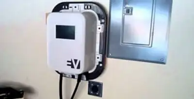 Electric car charger installation with wall-mounted EV charging station in New Orleans, LA
