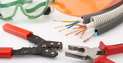 Electrical wiring repair with professional tools and safety equipment in Chalmette, LA