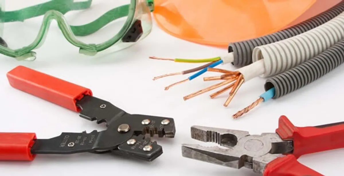 Electrical wiring repair with professional tools and safety equipment in Violet, LA