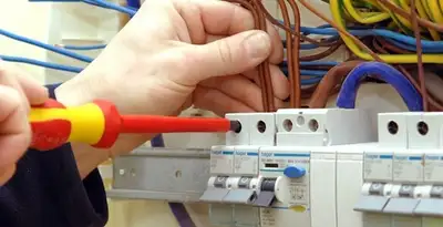 electrician services performing professional electrical panel wiring and connections in New Orleans, LA