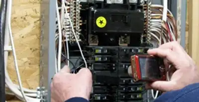 Home electrical inspection of circuit breaker panel by licensed electrician in New Orleans, LA