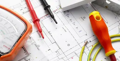 licensed electrician planning and testing electrical systems using professional tools in New Orleans, LA