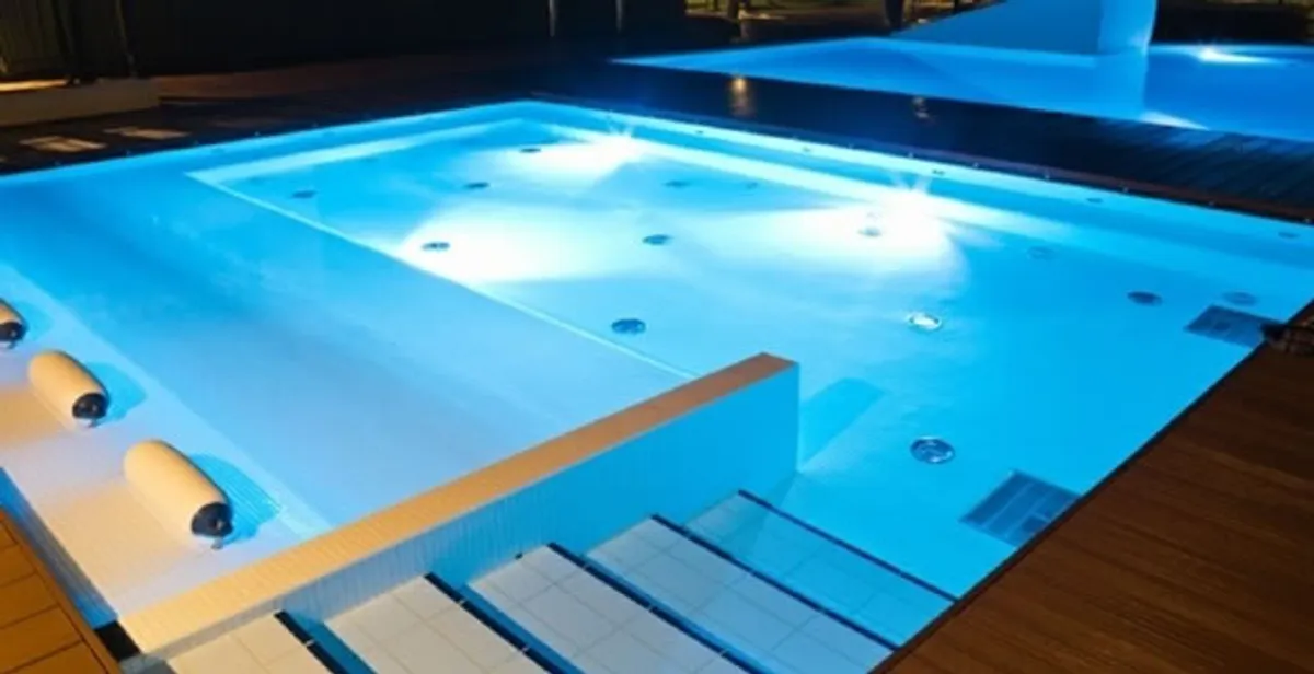 pool light installation and repair services providing modern illuminated pool lighting in New Orleans, LA
