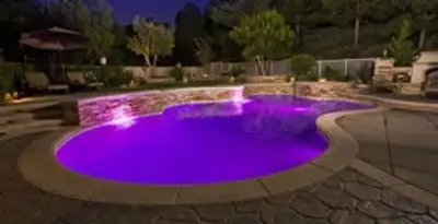 pool light installation and repair services illuminating a residential swimming pool in New Orleans, LA