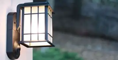 security light installation services with professionally mounted exterior wall light in New Orleans, LA