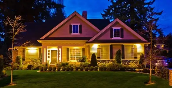 security light installation services illuminating a residential exterior at night in New Orleans, LA