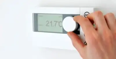 Thermostat installation service with professional adjusting temperature control in New Orleans, LA
