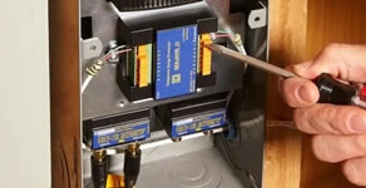 Whole home surge protection device being installed by a licensed electrician to protect electrical systems in New Orleans, LA
